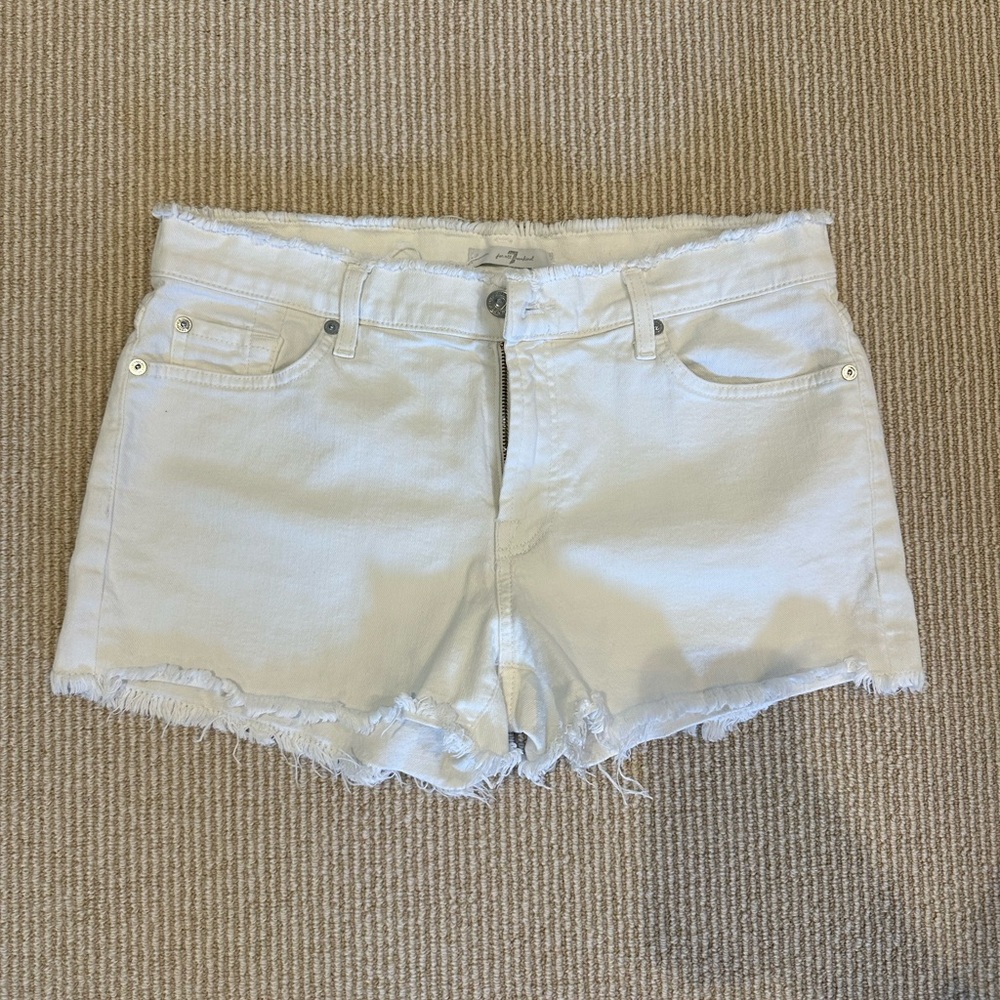 7 for all mankind white jean shorts with fringe detailing